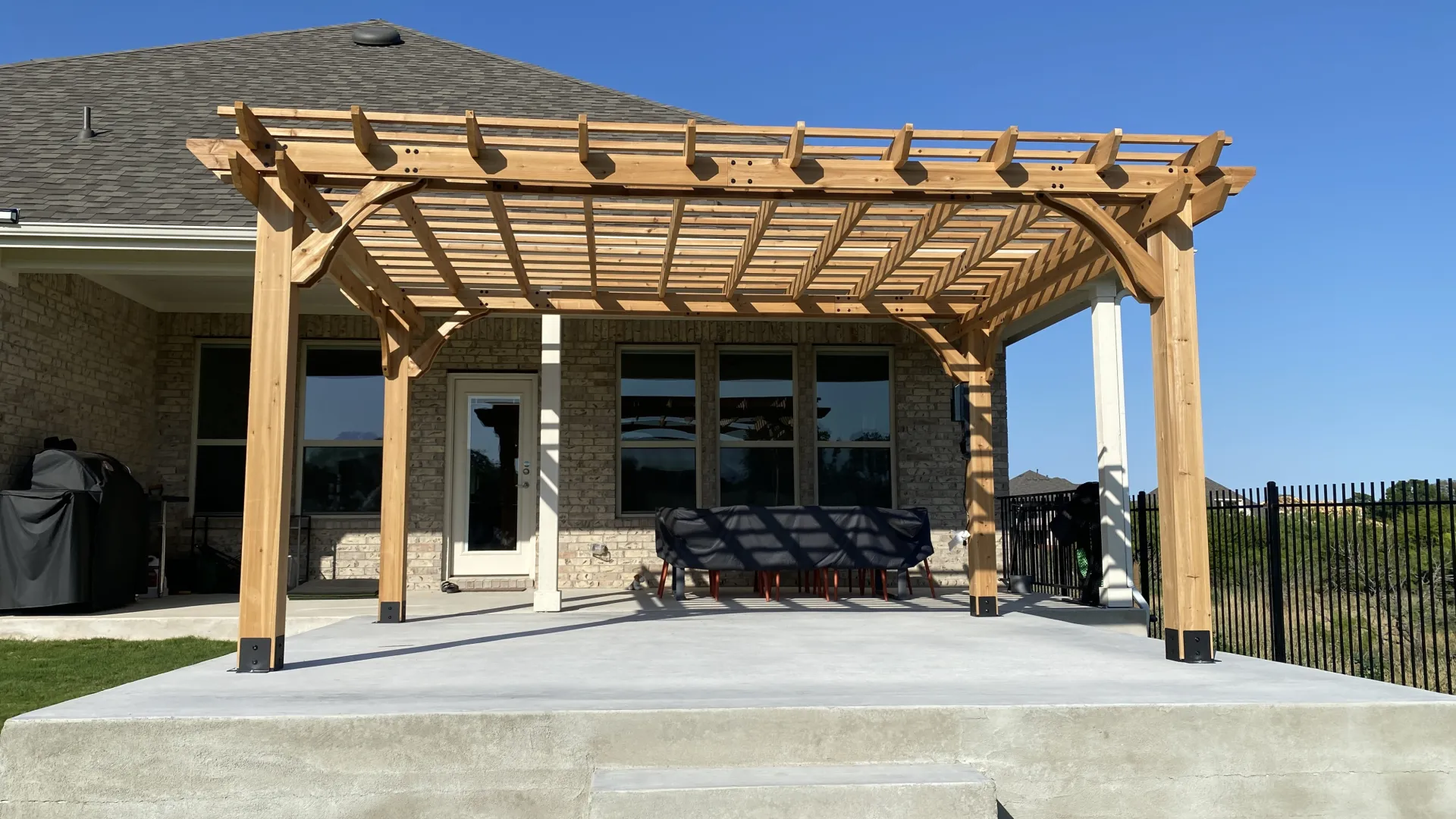 HandiestPRO installation team working on an outdoor structure